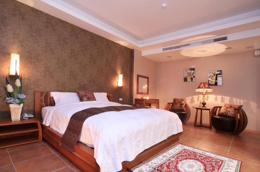 Spring Fountain Hotel Цзяоси Номер фото